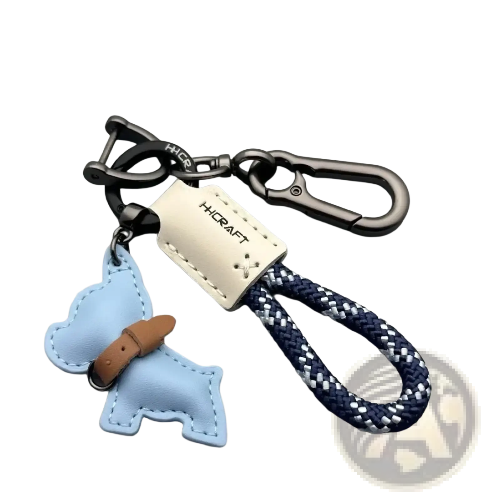 French bulldog leather keychain in light blue with brown collar detail attached to navy white braided rope loop