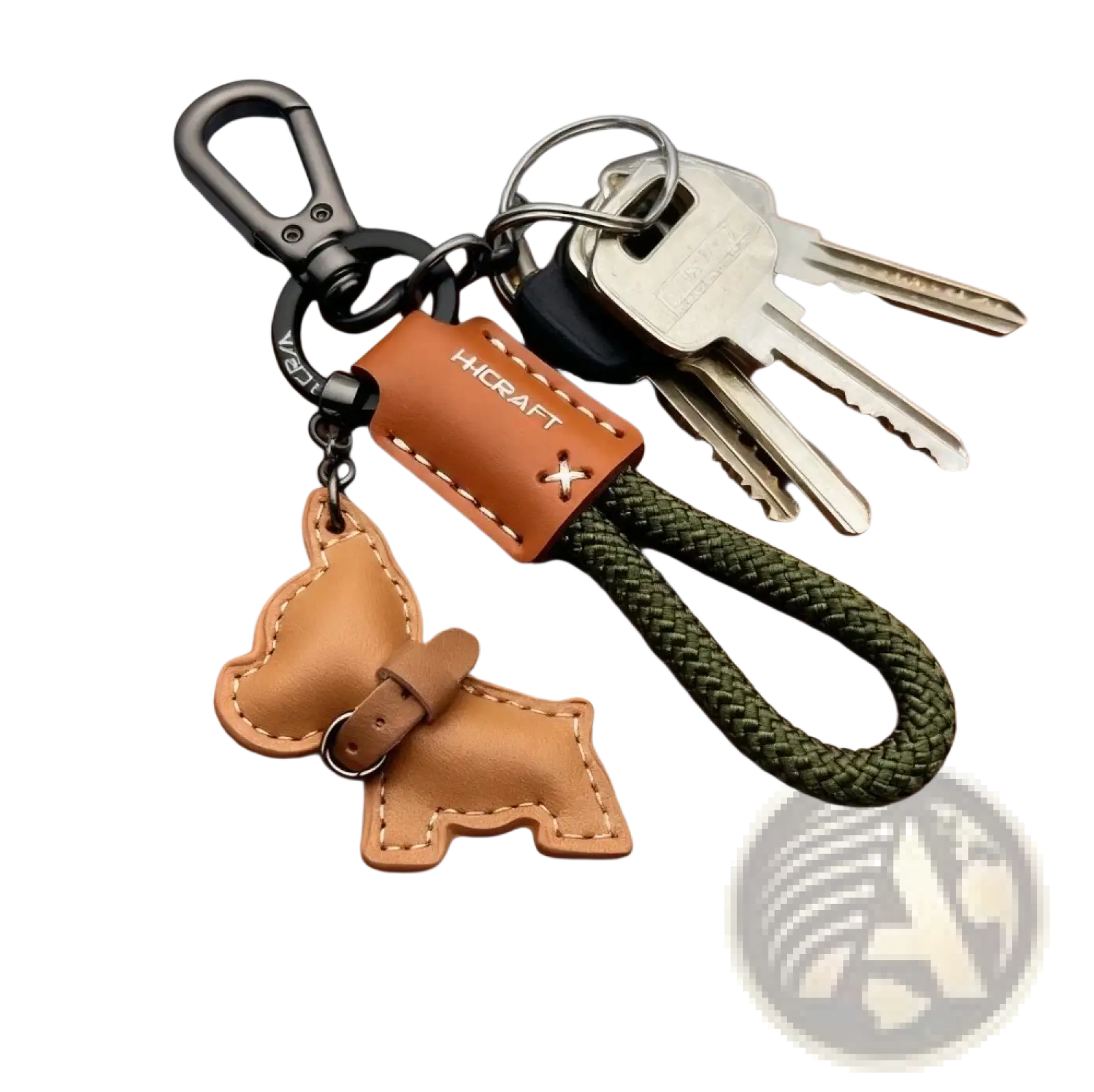 Tan leather French Bulldog keychain with stitched details and black carabiner attached to olive green braided cord