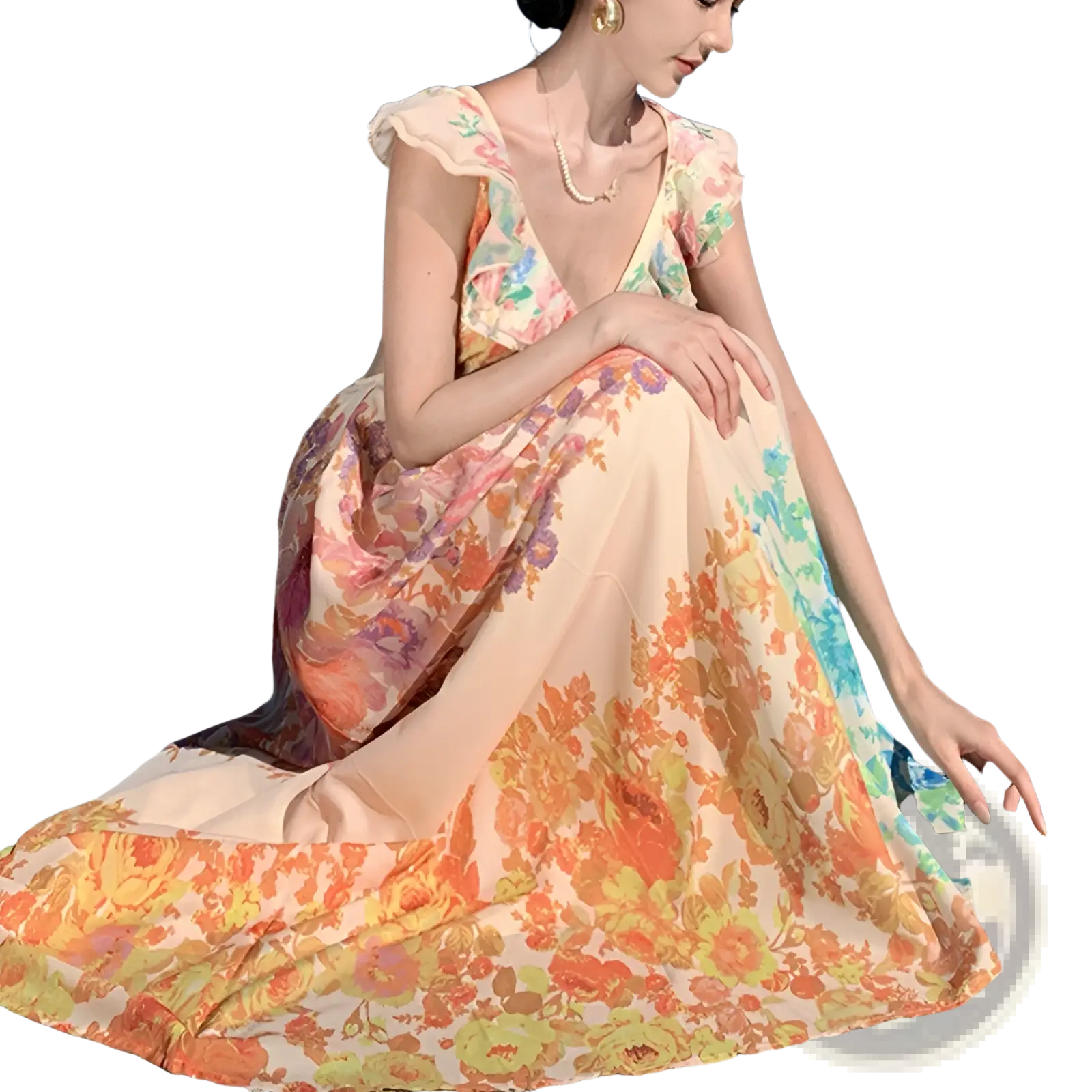 A flowing sleeveless French floral v neck ruffle maxi dress in soft peach and vibrant orange hues