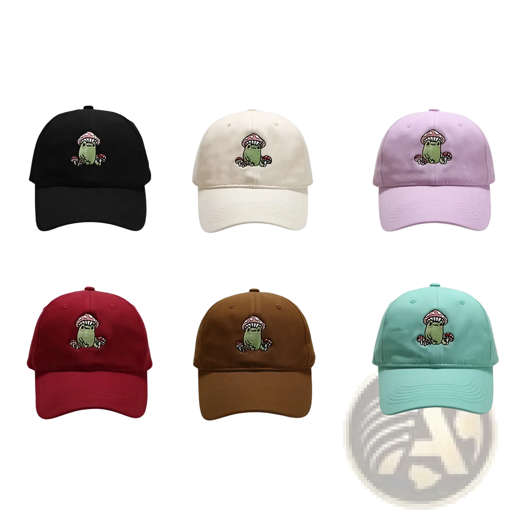 Six embroidered baseball caps in black cream pink red brown and teal with green frog mushroom design on front