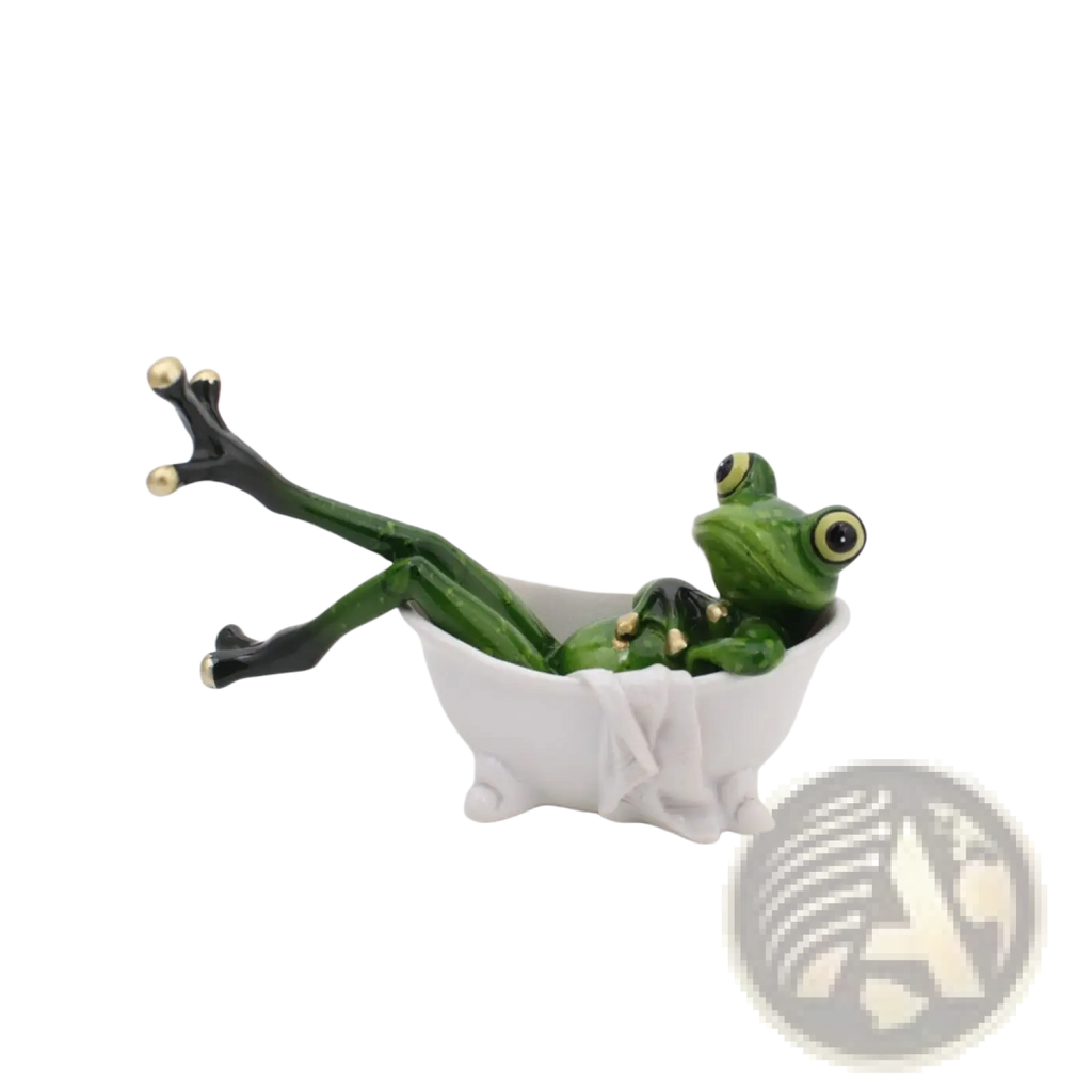 Green frog resin figurine with gold-tipped toes lounging in a white ceramic bathtub for whimsical home decor