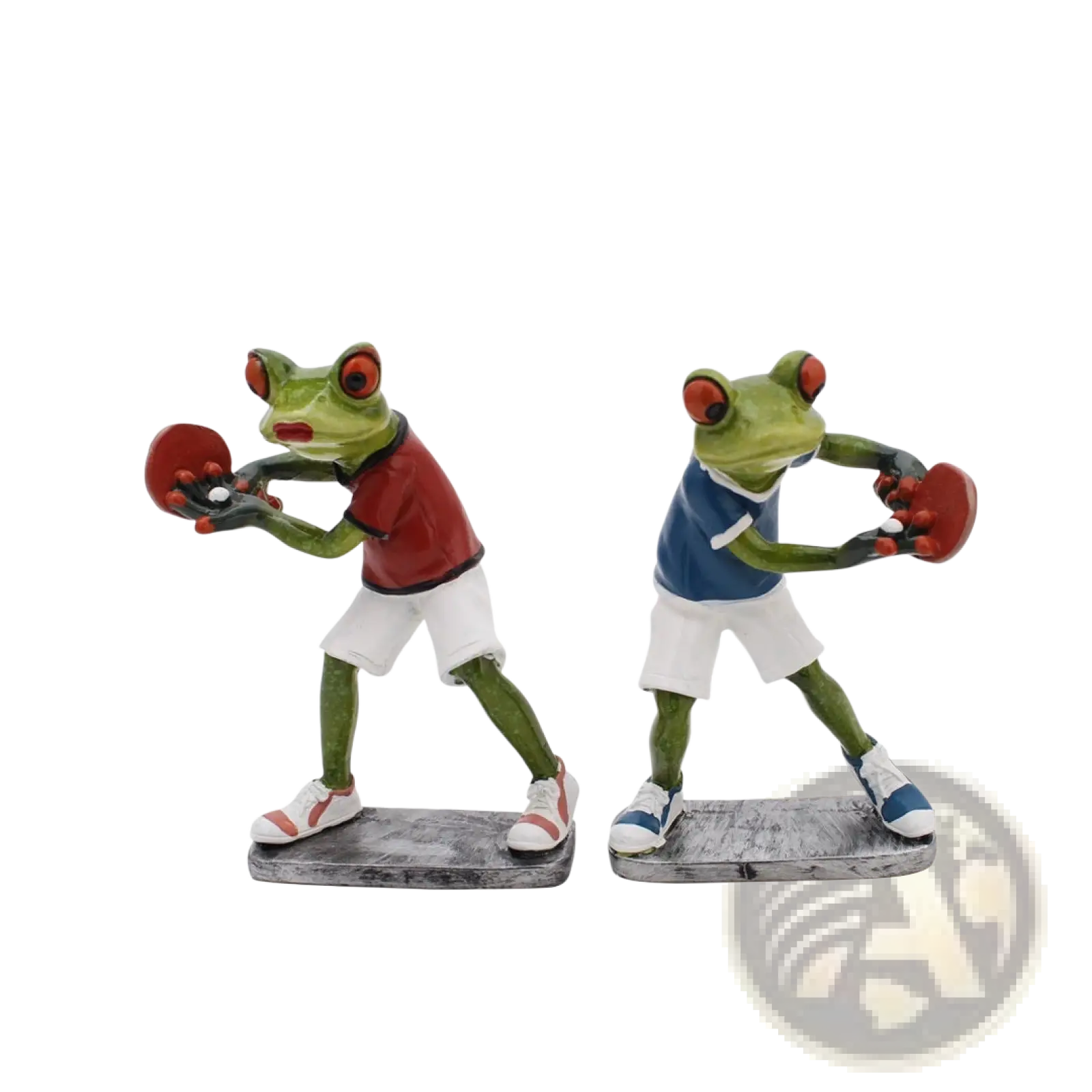 Two green resin frog figurine statues in red and blue athletic attire holding ping pong paddles for home decor