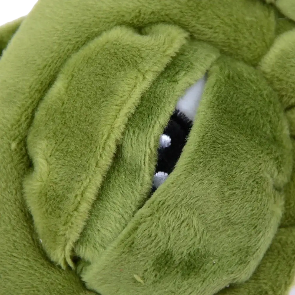 A plush green frog sleep mask with soft fuzzy fur, wide-open mouth, black eyes, white teeth finished goods
