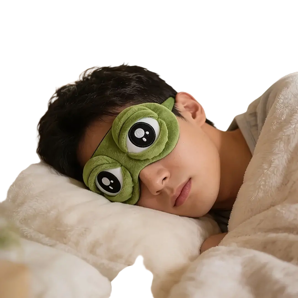 Green plush frog sleep mask with large black and white eyes made of soft material finished goods for sleep use