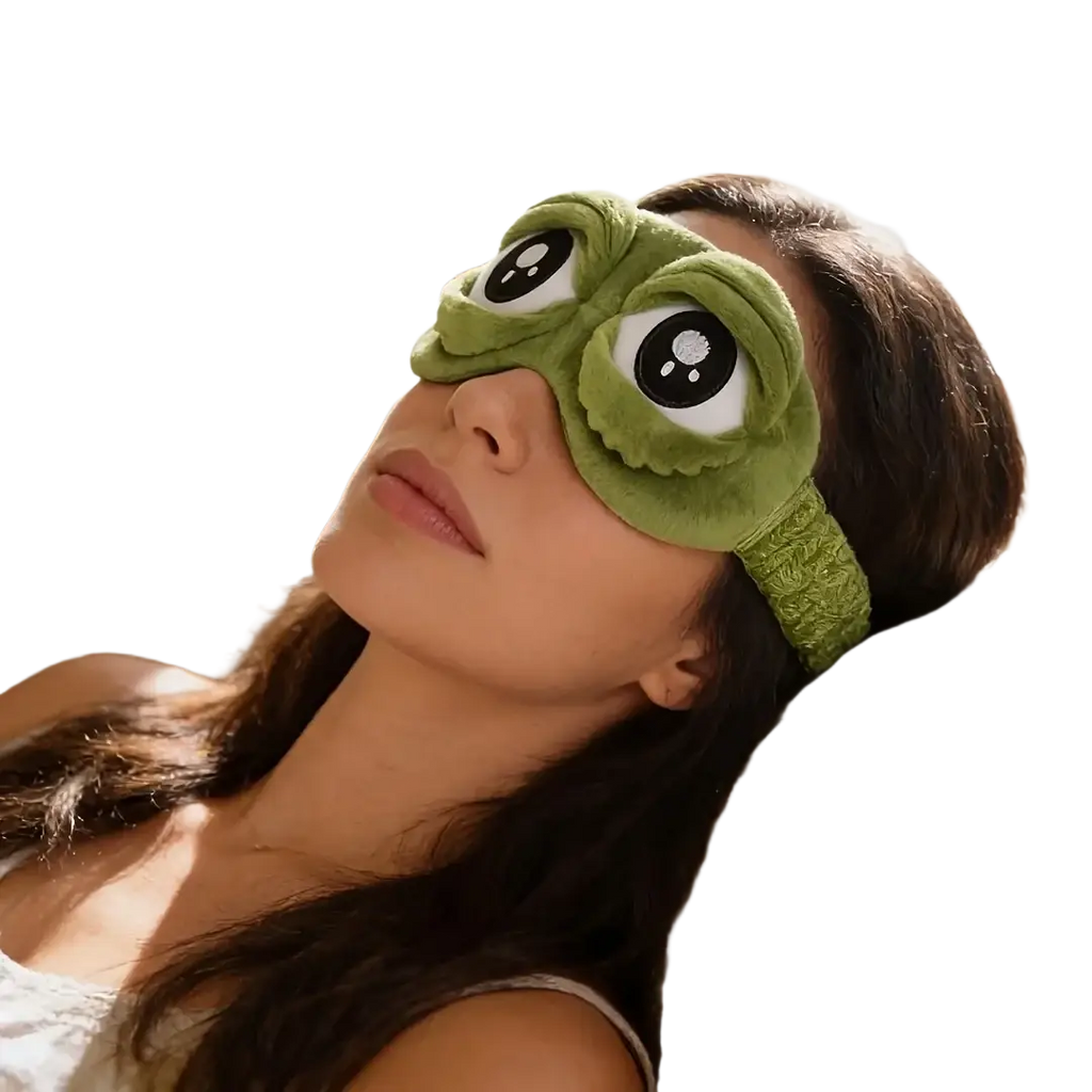 Green plush frog-shaped sleep mask with embroidered eyes and textured headband finished goods for comfortable use