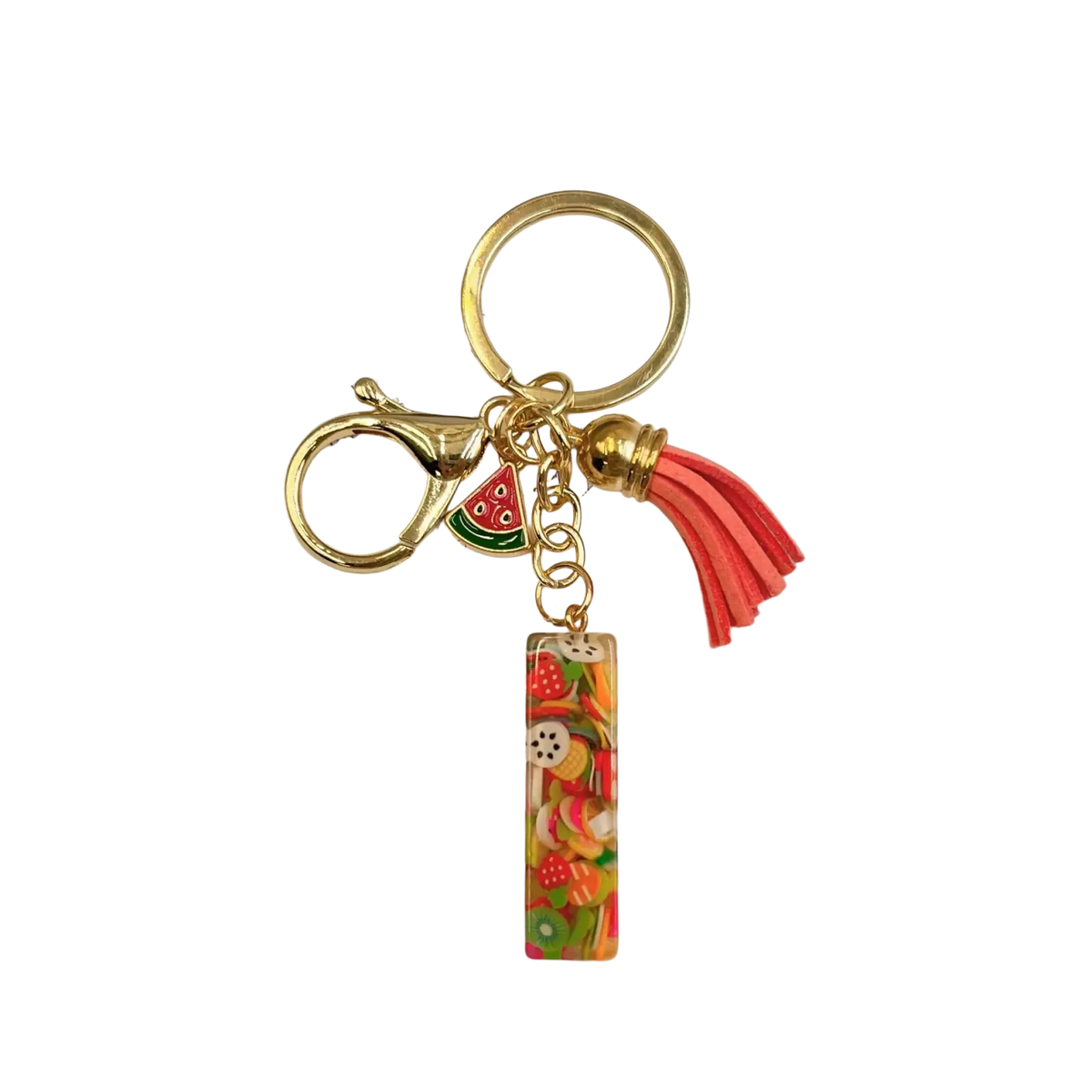 Gold-toned fruit letter resin keychain with vibrant rectangular charm filled with colorful fruit candy designs and coral tassel