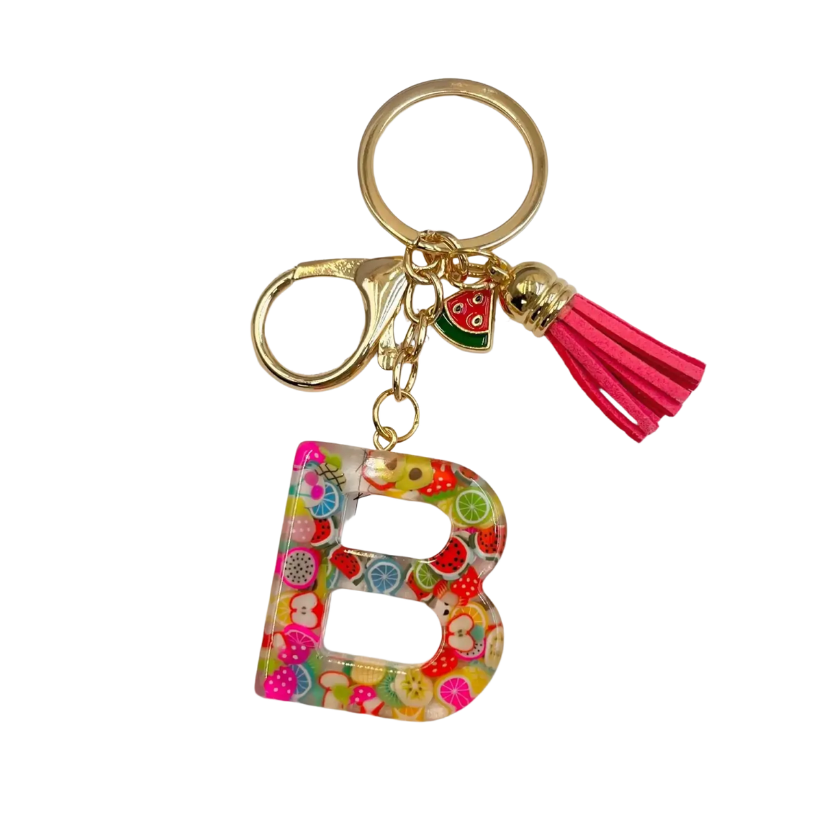 A vibrant translucent acrylic fruit letter resin keychain shaped like b with colorful fruit slices and gold ring charm