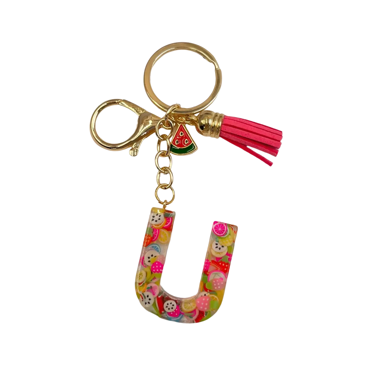A vibrant translucent resin keychain shaped like letter U with colorful fruit charms gold ring and pink tassel