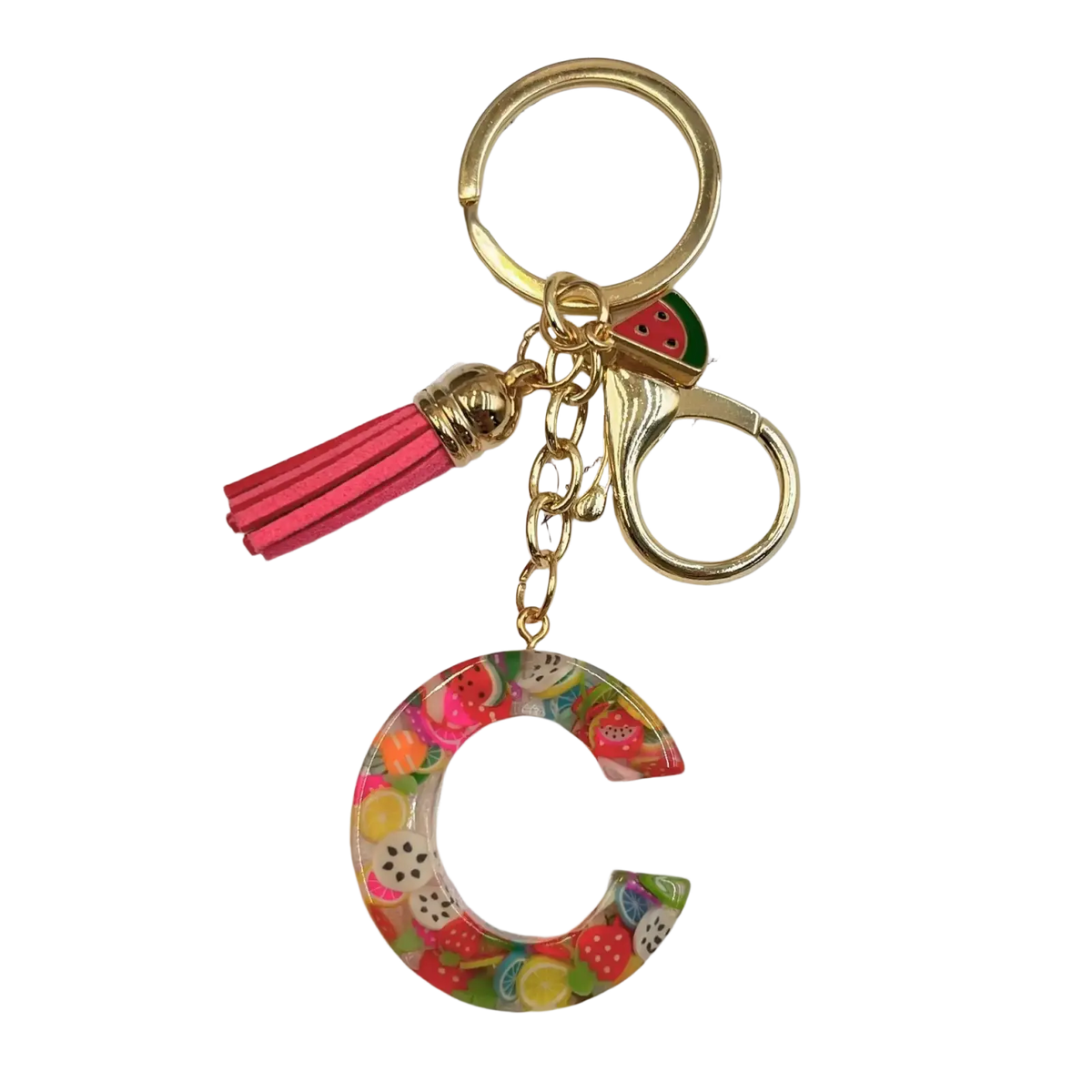 A vibrant translucent acrylic fruit letter c keychain with gold metal accents and pink tassel for keys or bags