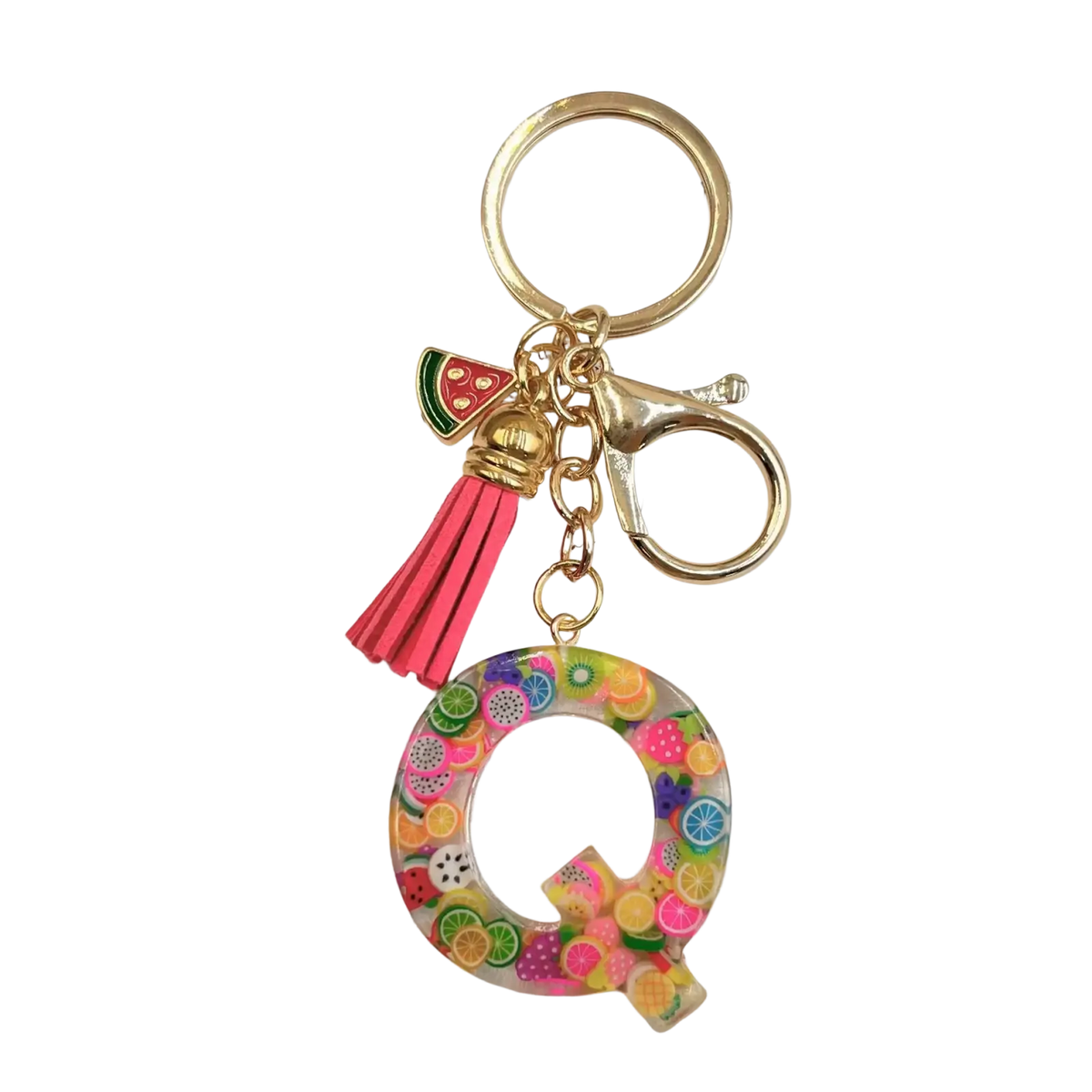 A vibrant transparent resin keychain letter q with colorful fruit charms pink tassel and gold-tone hardware