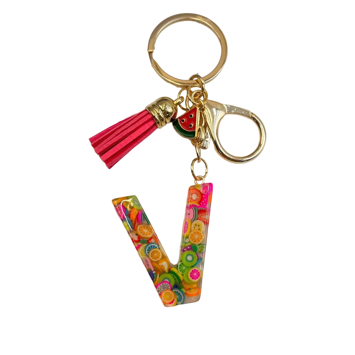 A vibrant transparent resin keychain shaped like letter v with colorful fruit slices pink tassel and gold accents