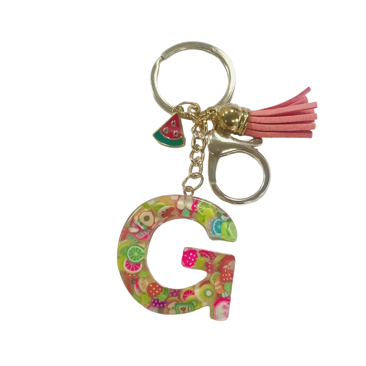A vibrant translucent resin keychain shaped like the letter g with colorful fruit charms gold ring and pink tassel