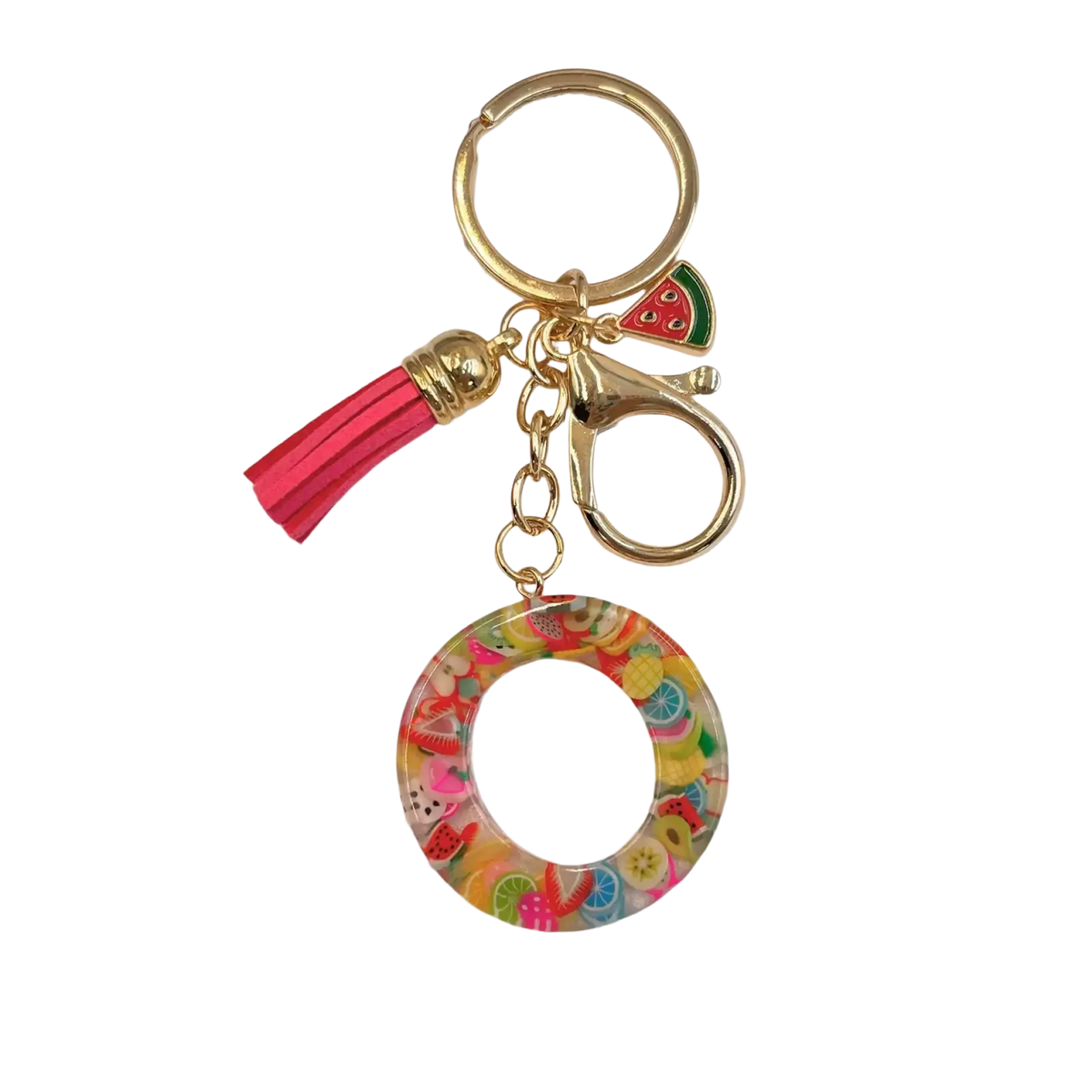 A vibrant circular fruit letter resin keychain with glossy finish and colorful embedded fruit slices in pink green yellow and orange