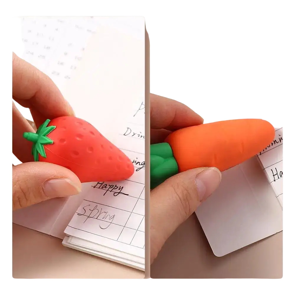 Fruit pencil erasers set featuring red strawberry and orange carrot shapes with green leafy tops for student stationery use