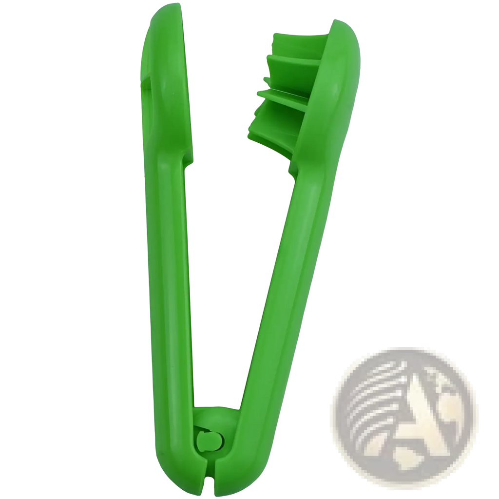 Bright green plastic fruit corer with toothed ridged design for easy pit removal in fruit slicer and citrus juicer set