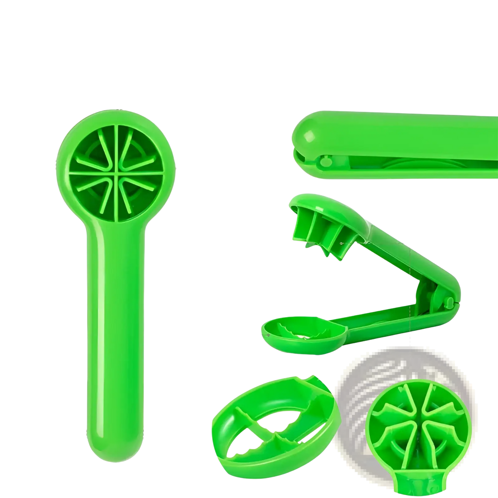 Bright green plastic nutcracker with handle and hinged jaws for cracking nuts in fruit slicer and citrus juicer set