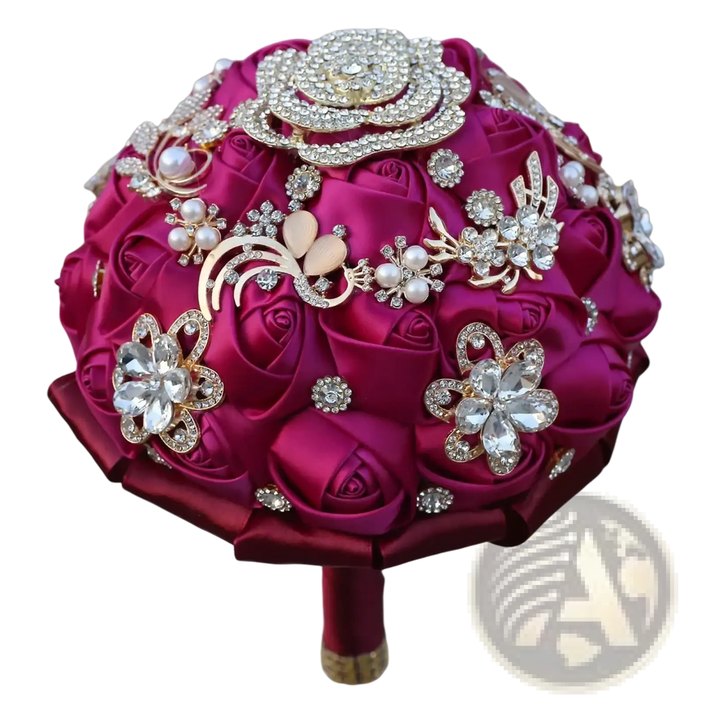 Fuchsia satin bridal bouquet with gold rhinestones featuring magenta satin, rhinestone brooches, pearls, and gold floral accents