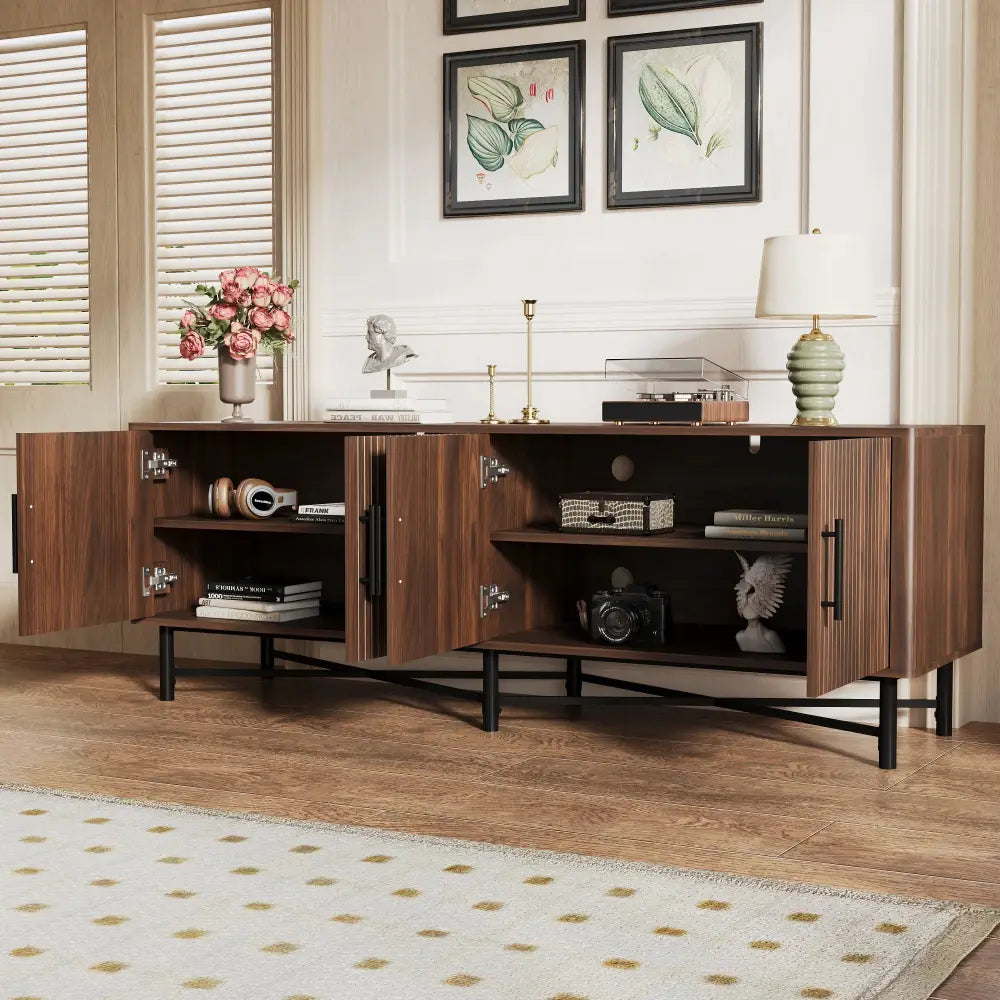 Chestnut 4 door TV cabinet with vertical slats warm brown wooden finish and black metal legs modern media console