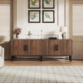 Chestnut wooden 4 door tv cabinet with vertical slats black metal legs and handles for living room storage