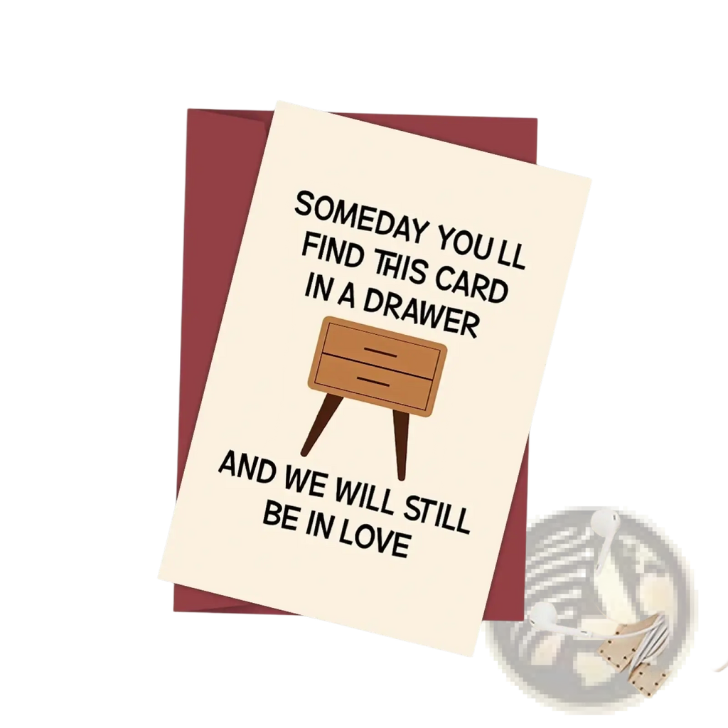 Cream-colored funny anniversary card for husband with black text and minimalist wooden dresser illustration on legs
