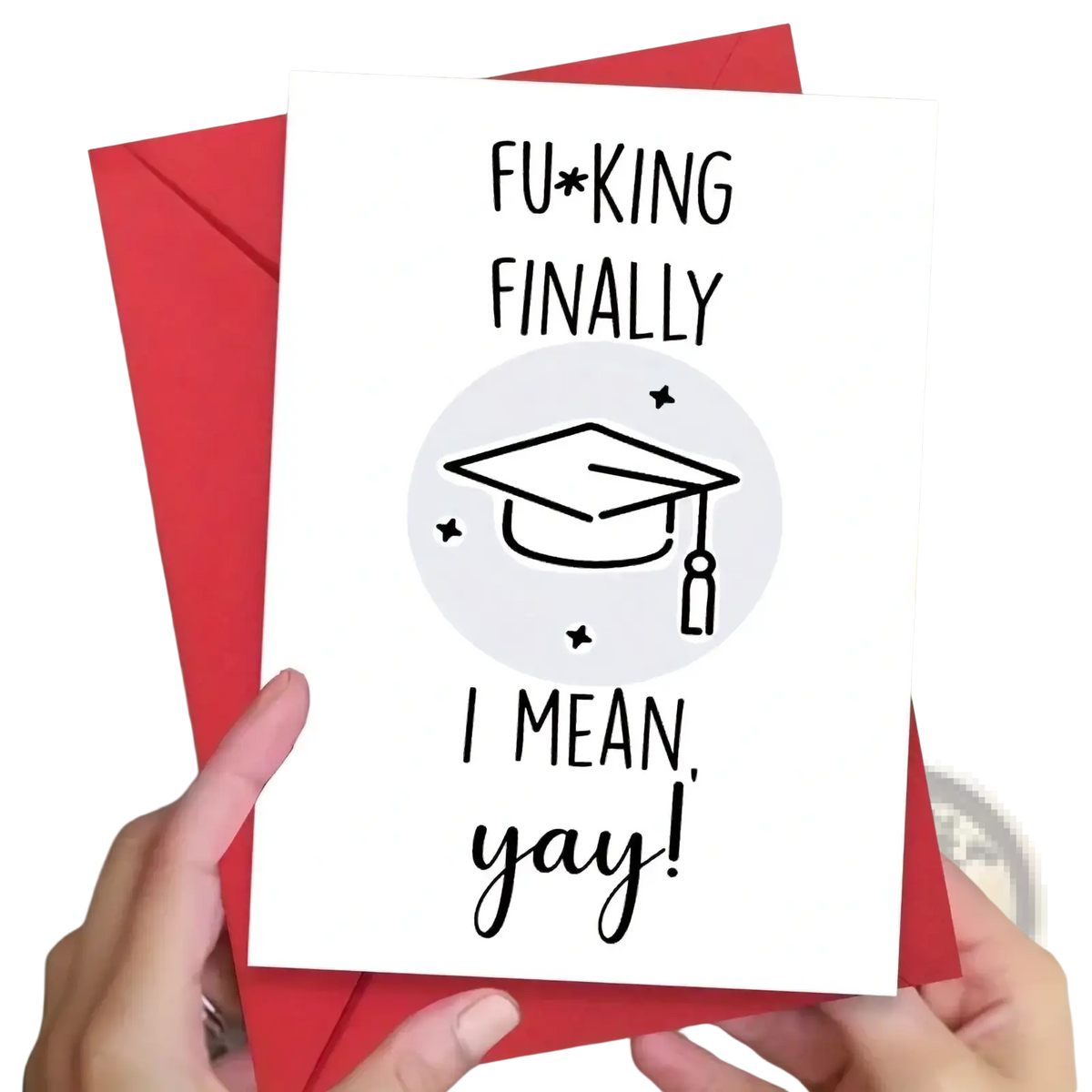 White greeting card with black text and gray graduation cap illustration held against a red envelope for graduation