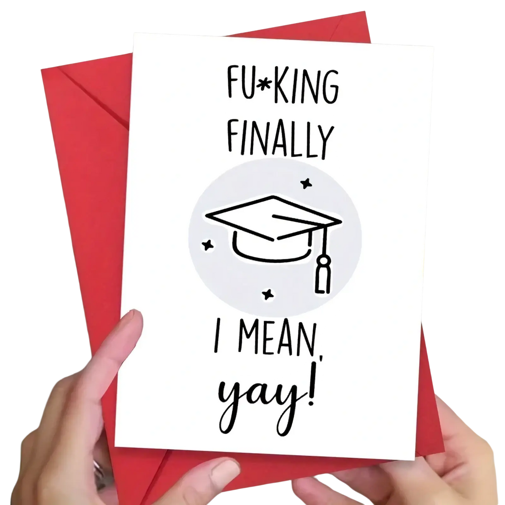White greeting card with black text and gray graduation cap illustration held against a red envelope for graduation