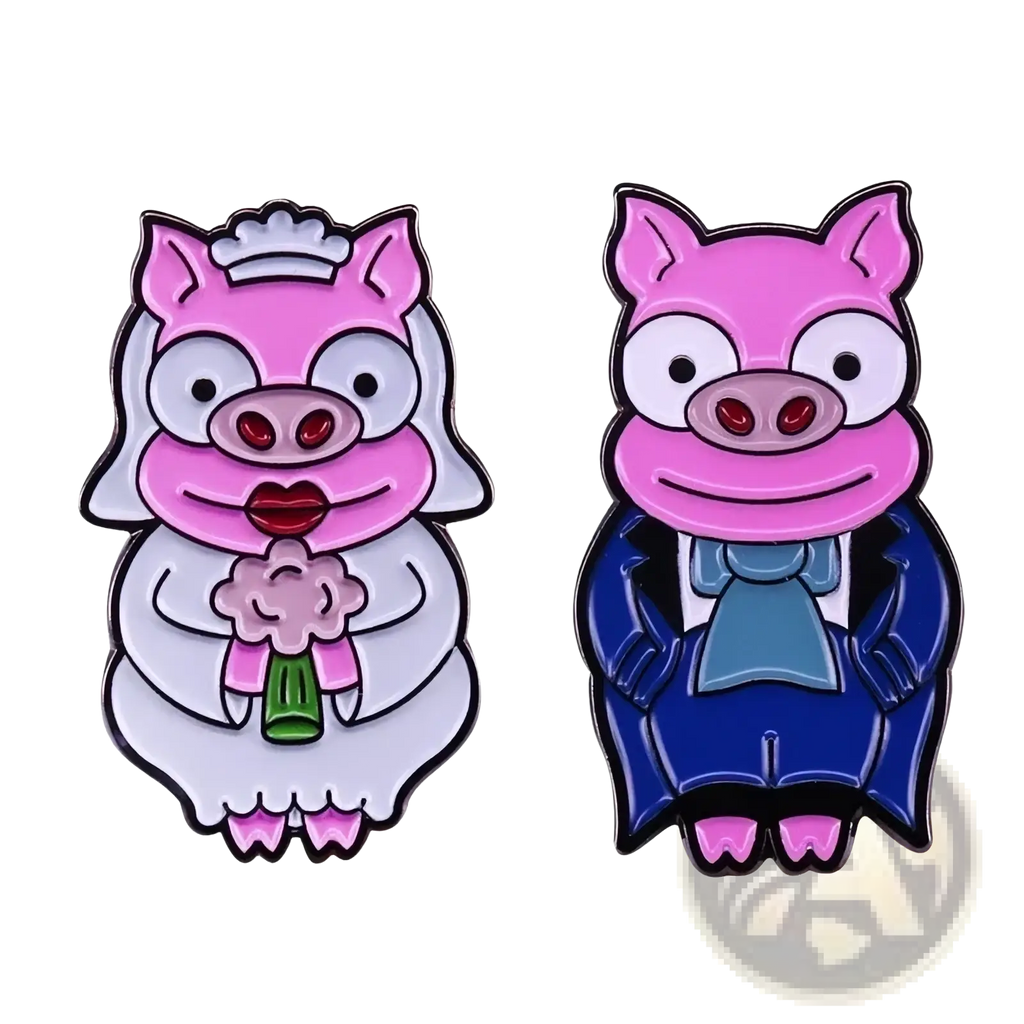Two pink cartoon pig enamel pins featuring a bride in white and groom in blue suit for funny wedding accessories