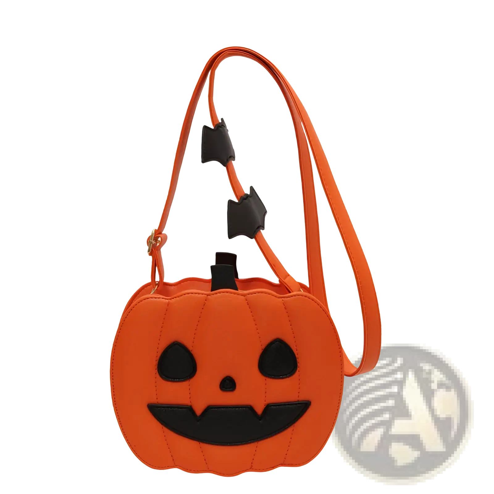 Orange pumpkin-shaped crossbody handbag with black stitched face and detachable bat charms on matching strap