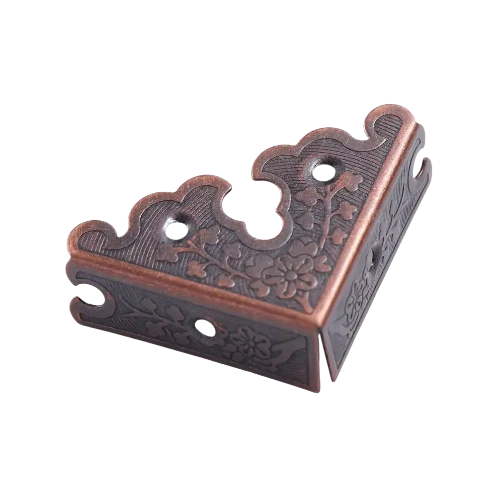 Antique brass furniture protector corner bracket in bronze color with intricate floral and scrollwork engraving