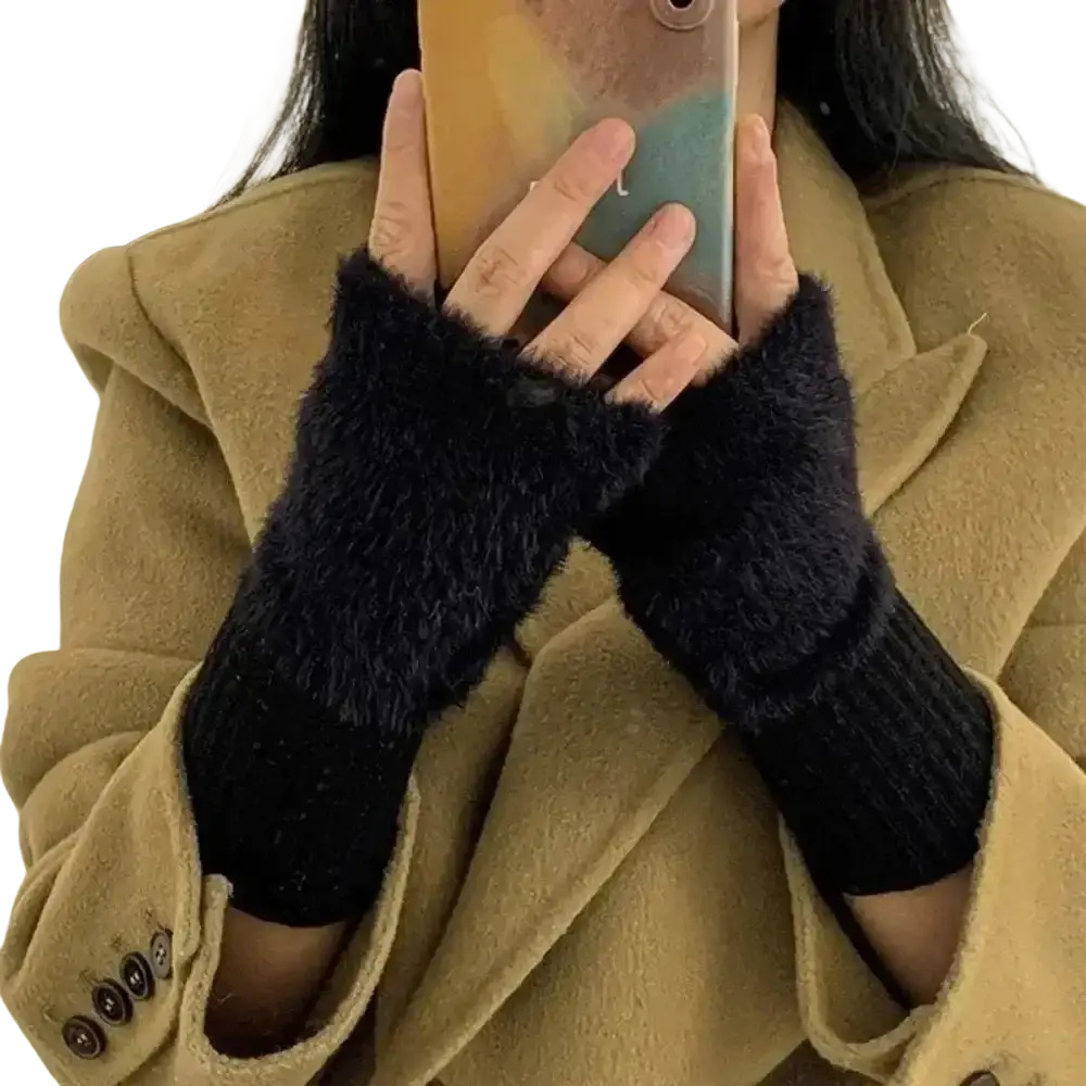 Black fuzzy fingerless knit gloves for women with ribbed knit cuff offering warmth and style