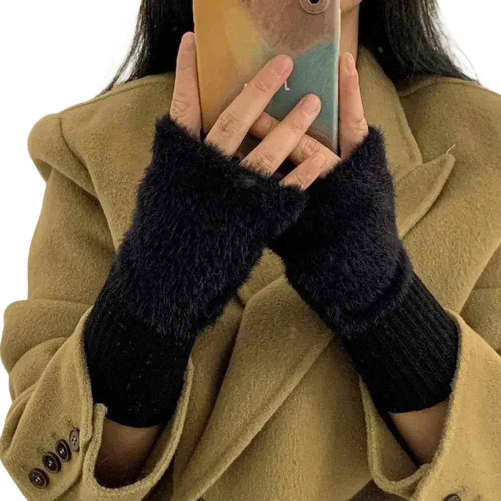 Black fuzzy fingerless knit gloves for women with ribbed knit cuff made from soft material for warmth and comfort