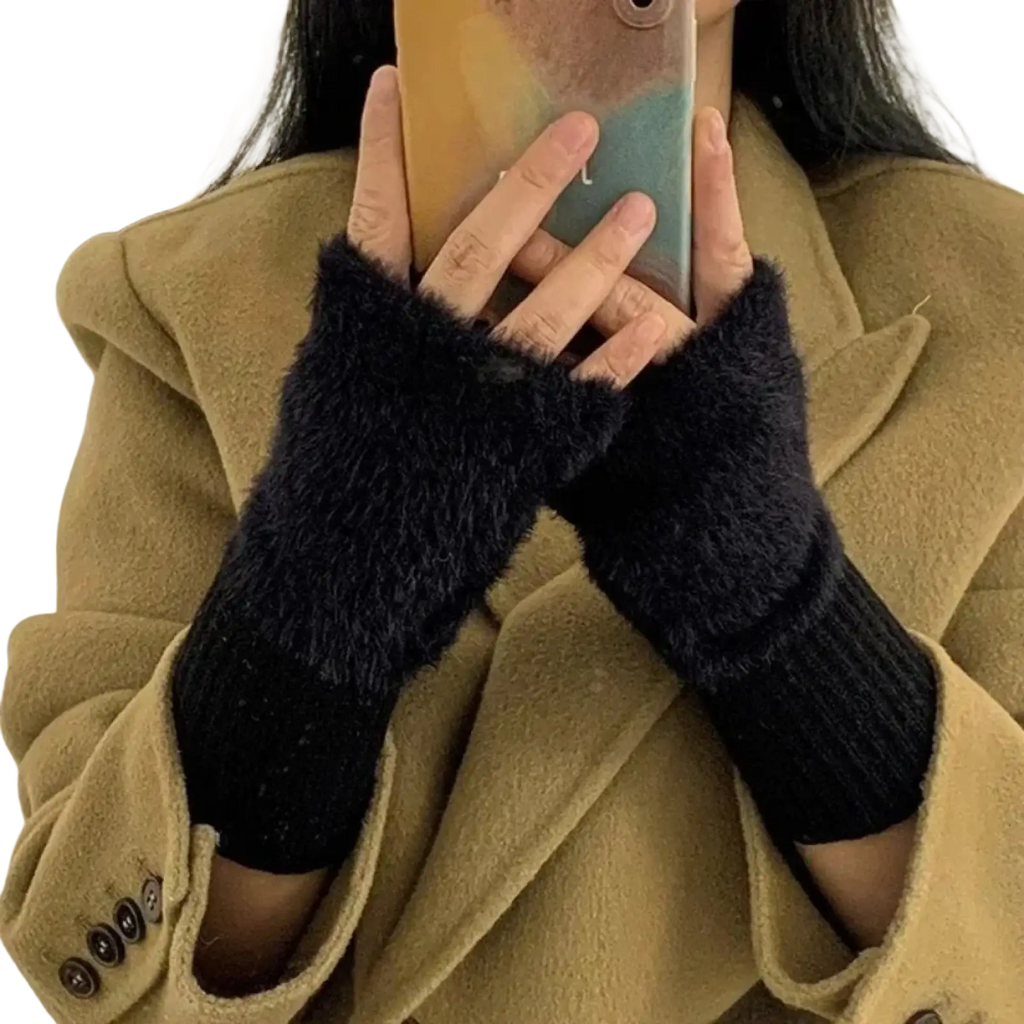 Black fuzzy fingerless knit gloves for women with ribbed knit cuff made from soft material for warmth and comfort