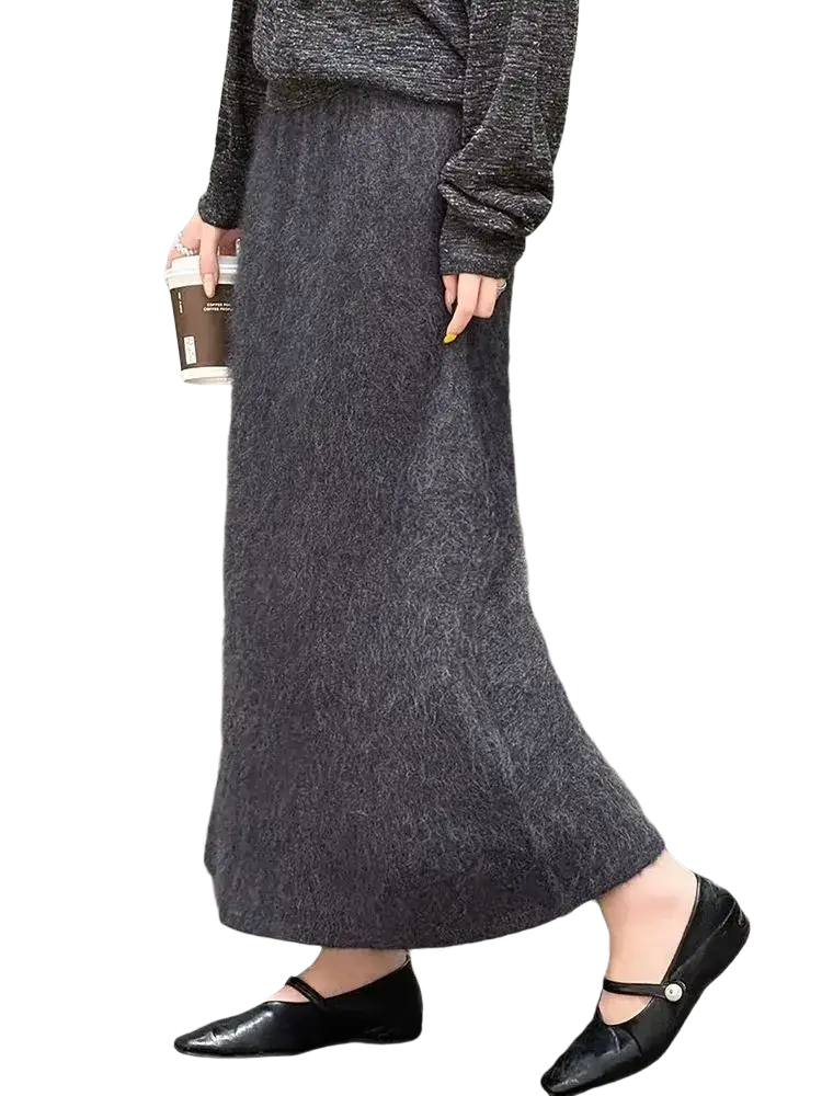 A long dark gray fuzzy mohair wool a-line midi skirt with soft textured fabric for elegant wear