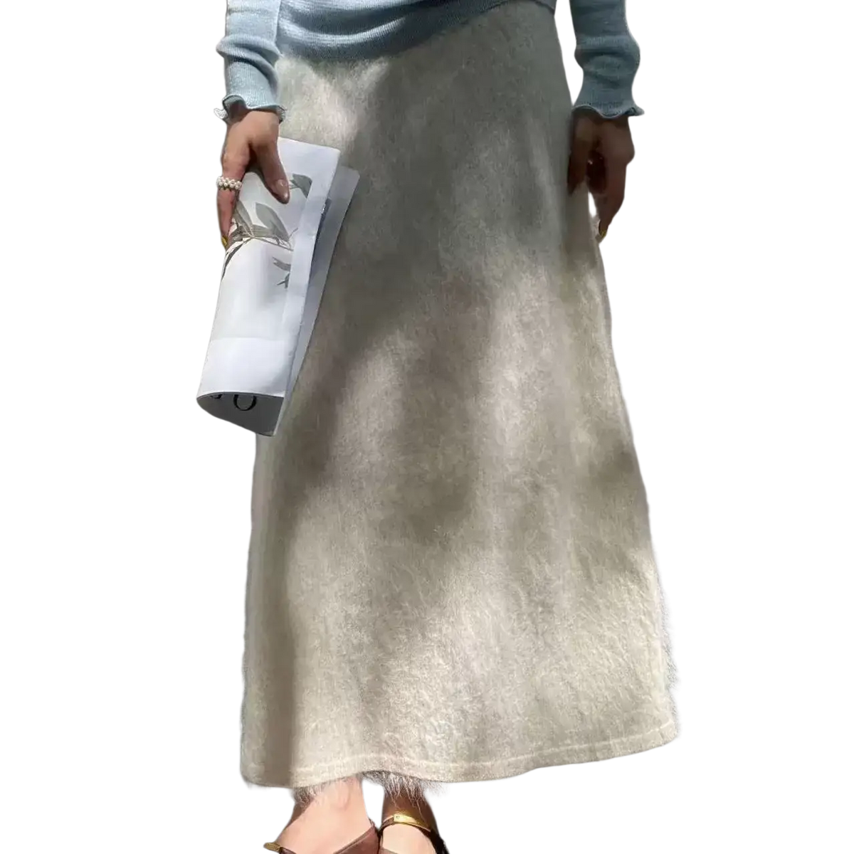 A soft cream-colored fuzzy mohair wool a-line midi skirt with a flowing silhouette