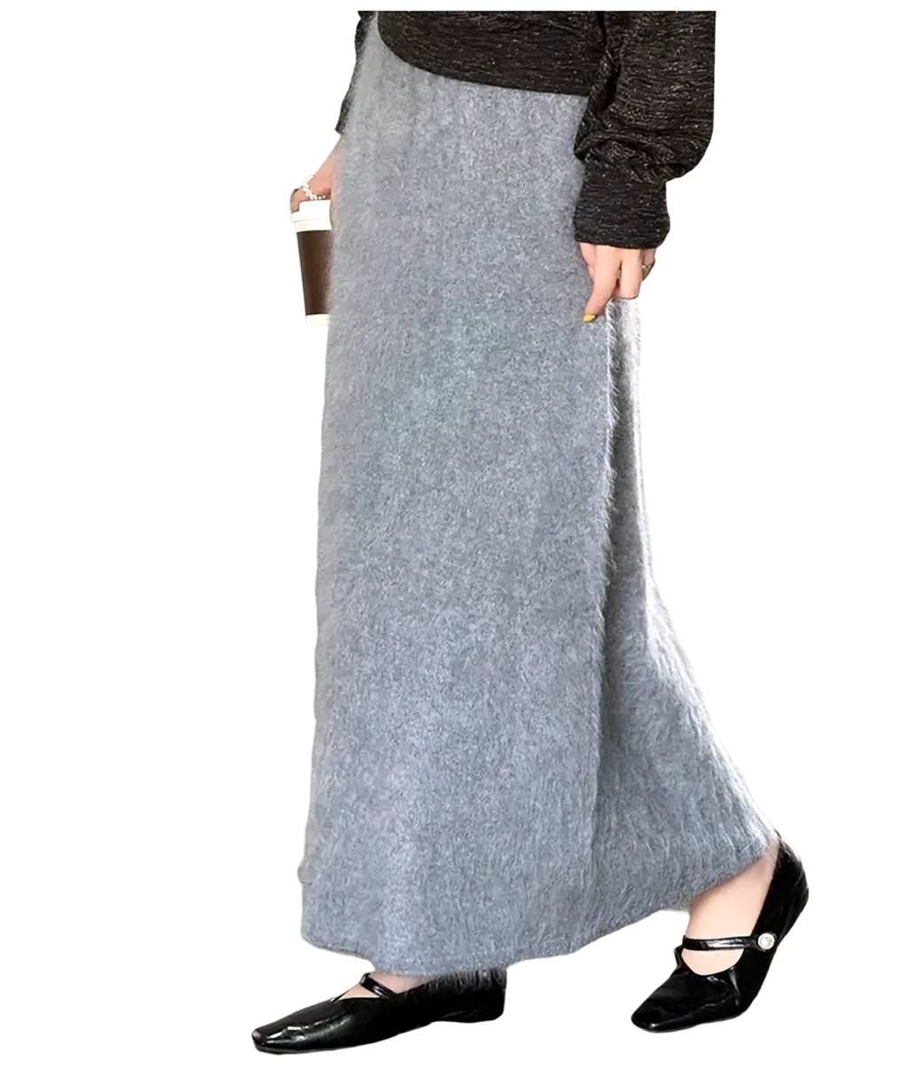 A soft gray fuzzy mohair wool a line maxi skirt with a flowing silhouette suitable for elegant occasions