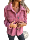 A cozy pink fuzzy teddy coat for women with plush texture and dark brown buttons perfect for winter warmth