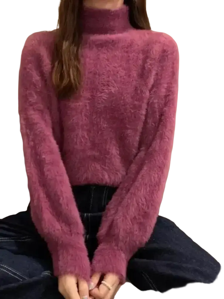 A plush magenta fuzzy turtleneck sweater for women with long sleeves ideal for winter warm knitwear