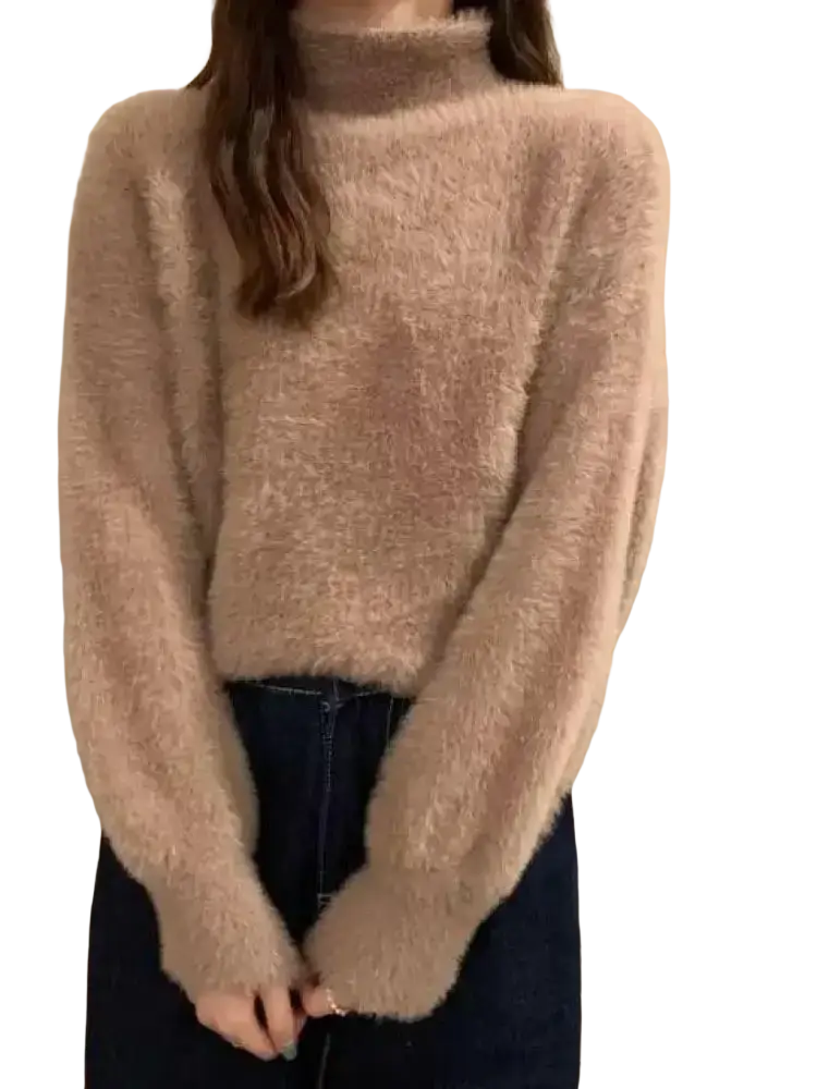 A soft fluffy beige fuzzy turtleneck sweater for women with cozy textured knit winter warm top