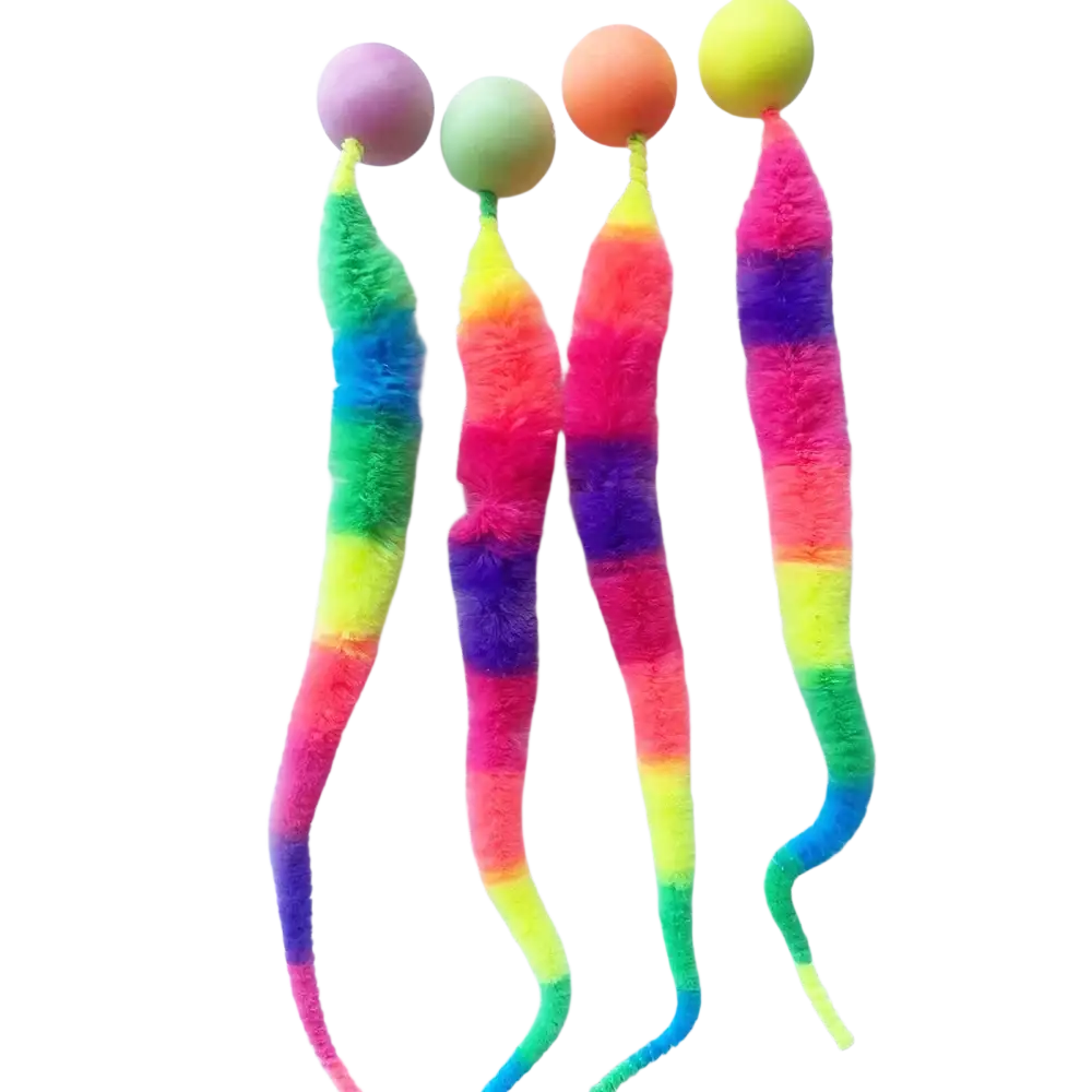 Fuzzy worm cat toys with rainbow stripes, fuzzy material, and round pom-pom tops featuring bouncy balls
