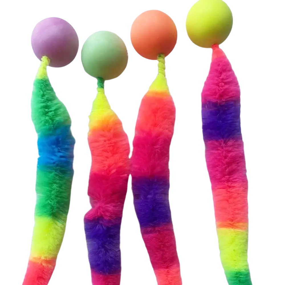 Four colorful fuzzy worm cat toys with rainbow-striped bodies and smooth plastic heads in pastel pink green orange and yellow