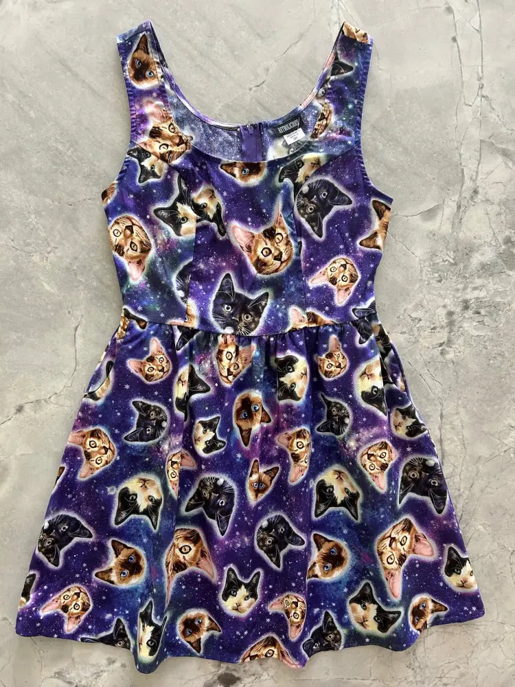 Galaxy cats purple fit and flare cotton dress with a sleeveless design and vibrant galaxy print featuring colorful cat faces