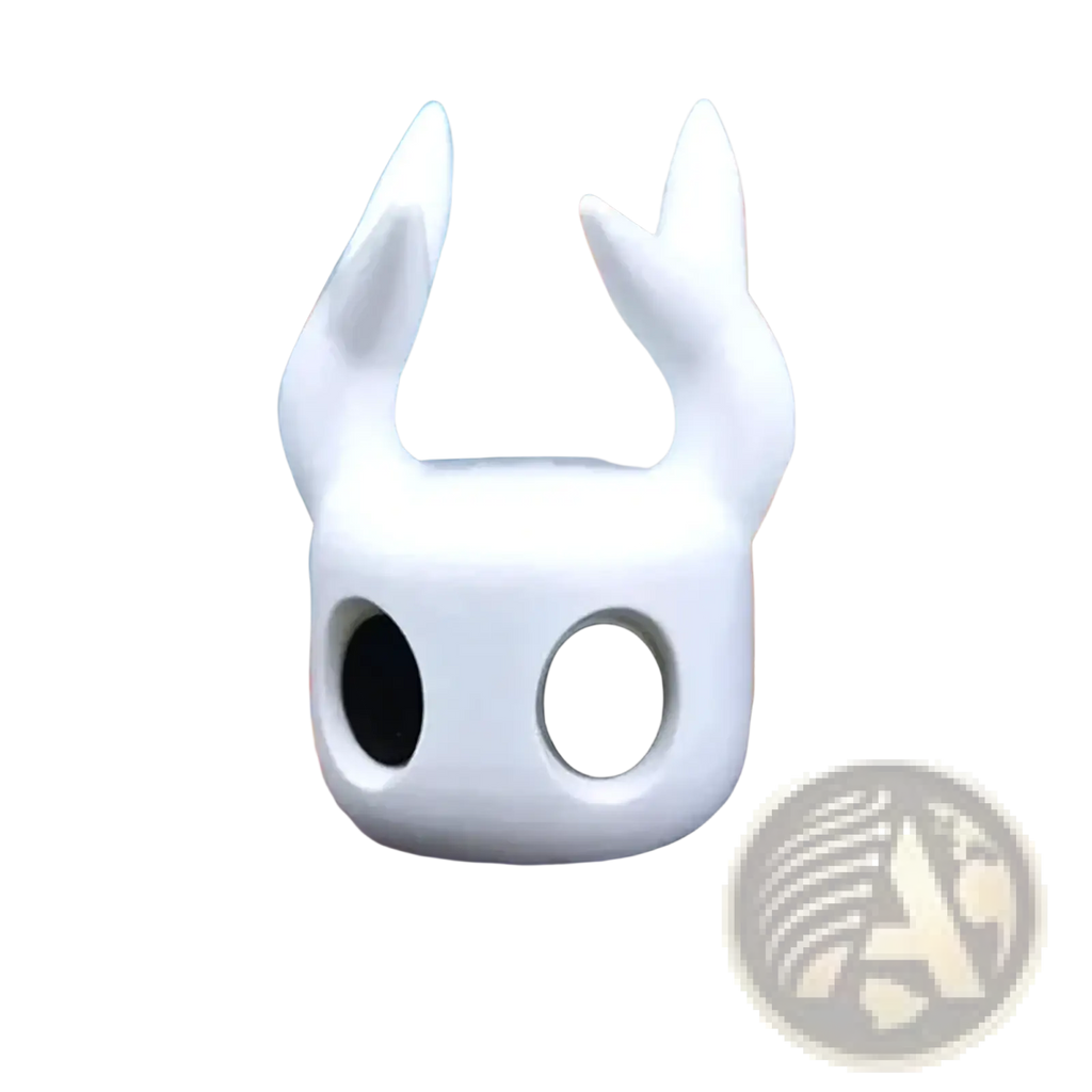White smooth hollow knight head-shaped game controller stand with large black eyes and pointed ears for desktop display