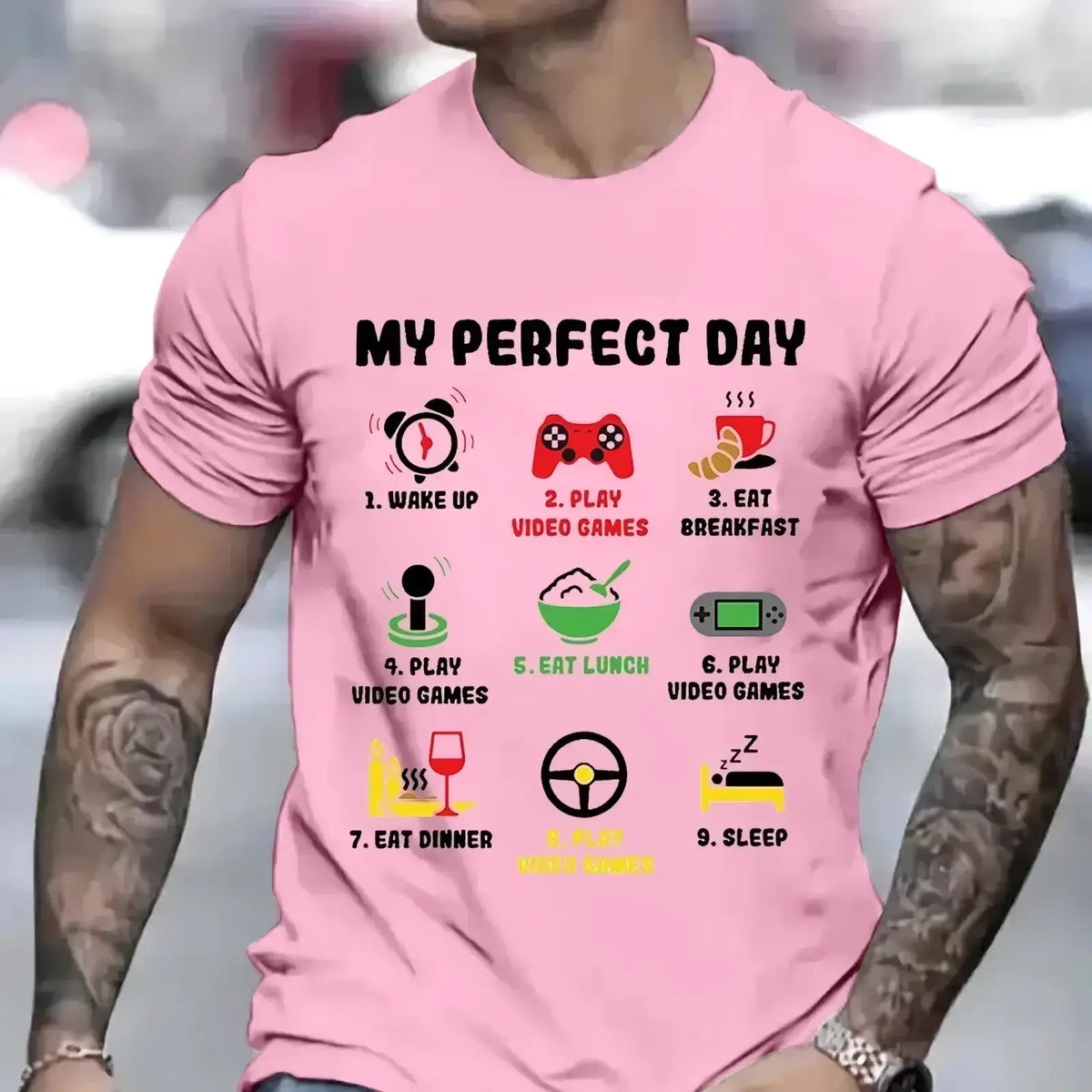 Pink short-sleeved gamer perfect day graphic t shirt for men featuring a perfect day routine print with icons and text