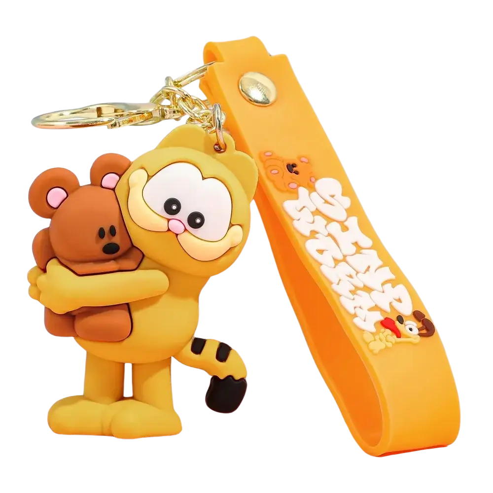 Yellow Garfield rubber keychain holding a brown bear with soft rubber material and gold-tone metal hardware