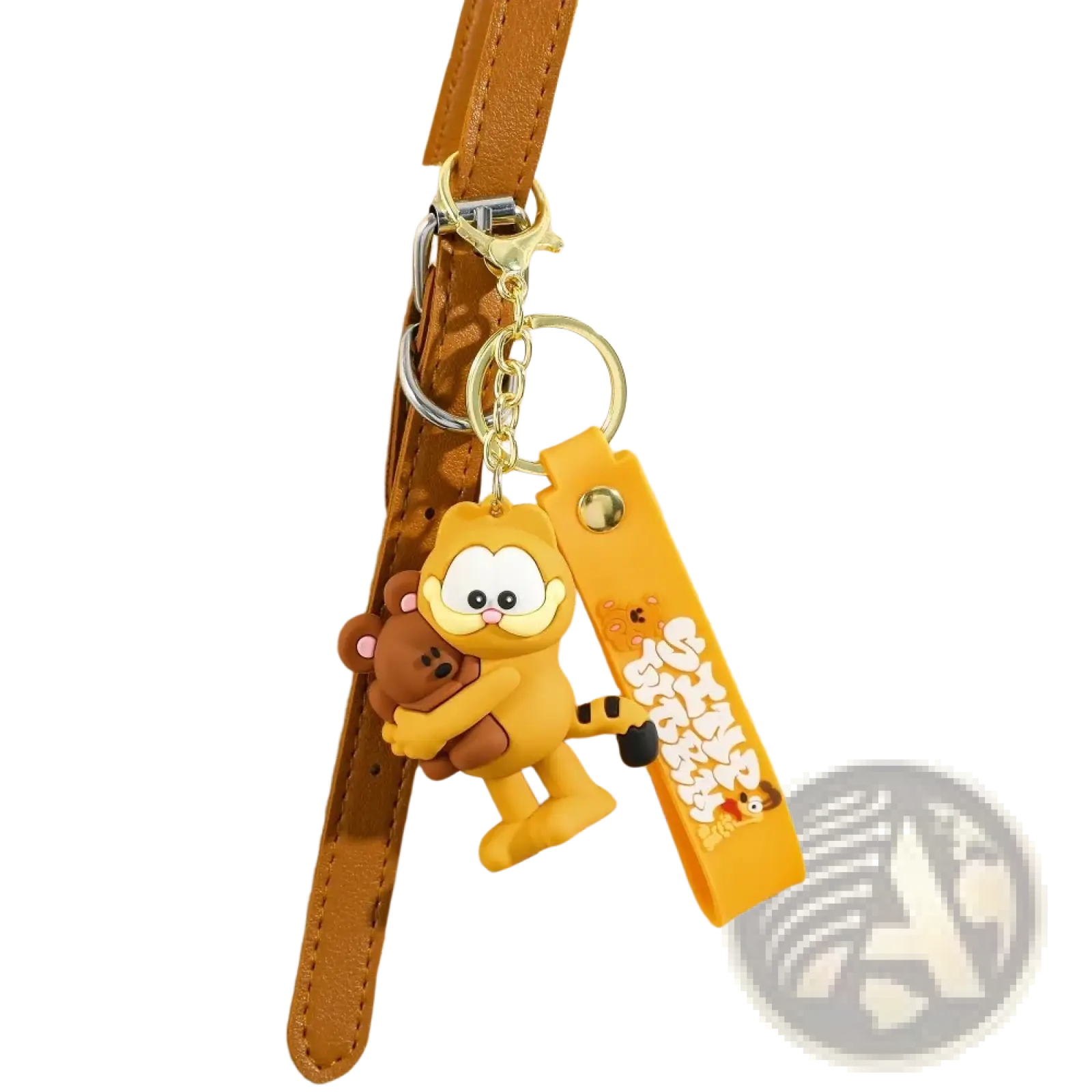 Yellow rubber Garfield keychain holding a brown teddy bear as an anime cat key pendant accessory