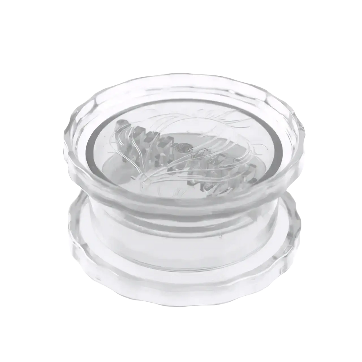 Clear glass coaster with subtle floral etching complementing the multifunctional manual garlic press kitchen tool