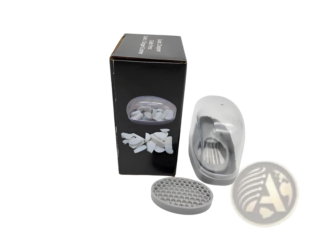 Gray plastic and metal garlic press with stainless steel blades and clear protective lid for easy chopping