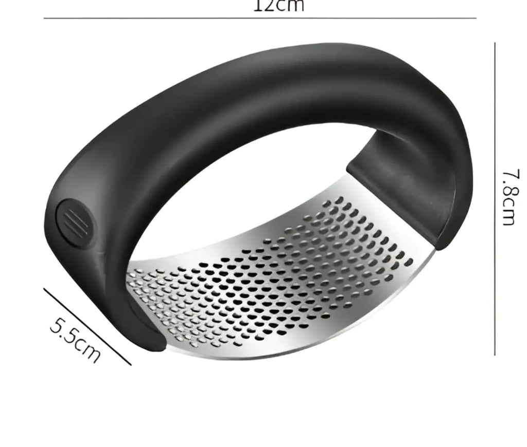 Black-handled stainless steel garlic press with curved perforated grating surface ergonomic manual mincer tool