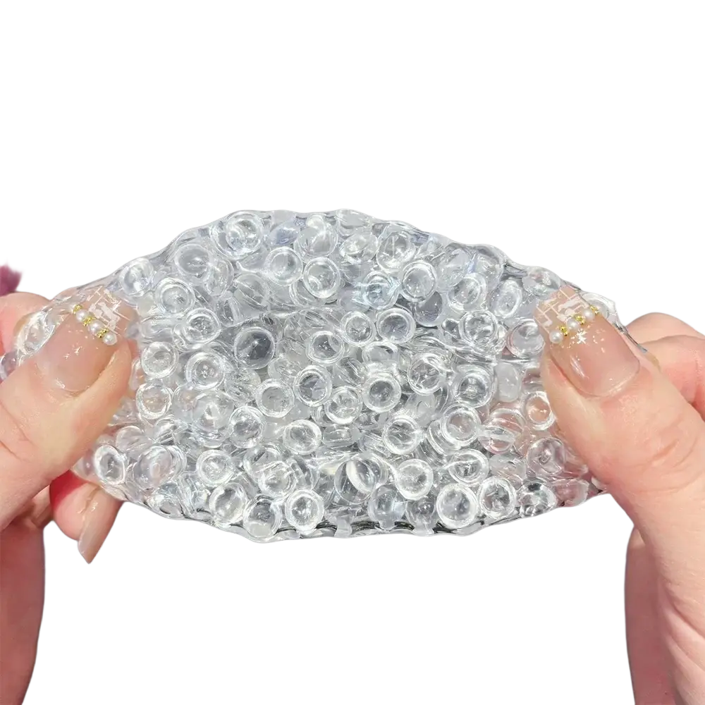 Clear gel ice bead stress relief squeeze toy with transparent beads held in hands for sensory relaxation