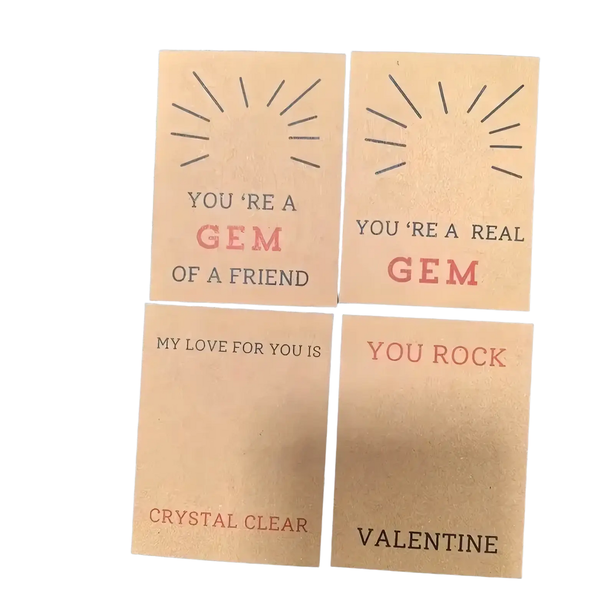 Four square kraft paper gemstone heart valentine cards with embossed sunburst designs and printed messages
